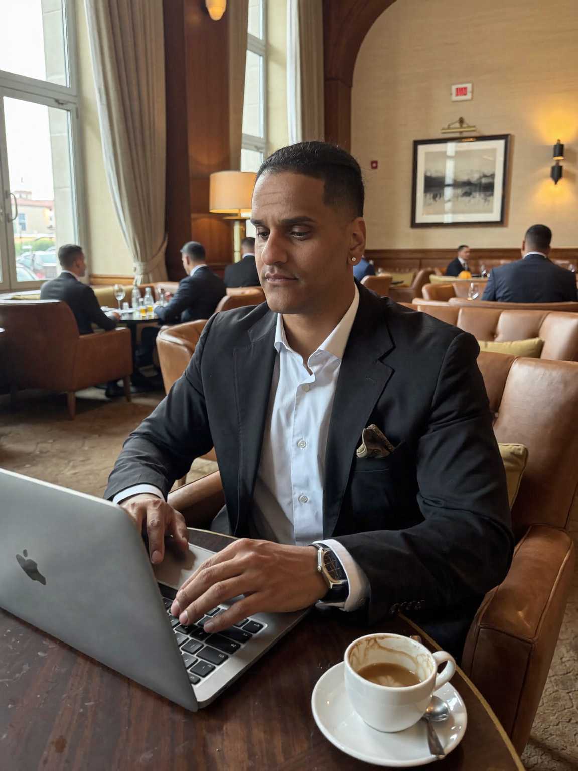 Justin Tricoche reviewing a deal